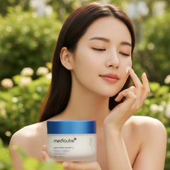 Woman Applying Cream - Garden